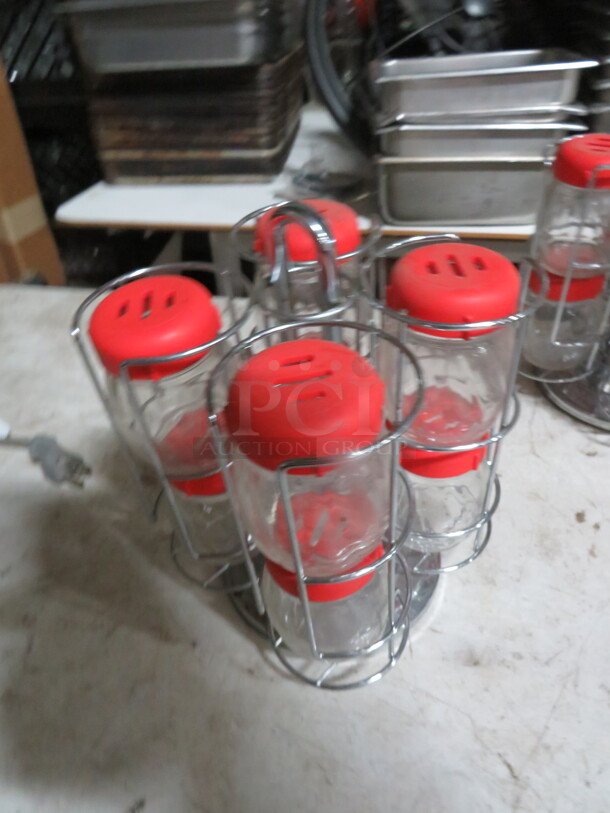 Stainless Steel Table Top Holder With 8 Cheese/Pepper Shakers. - Image 2 of 2