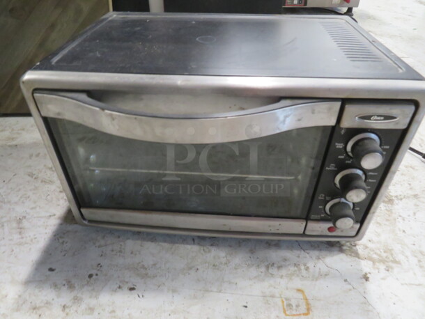 One Oster Toaster Oven. #608-1-000