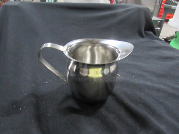 One NEW Update 8oz Stainless Steel Bell Creamer.