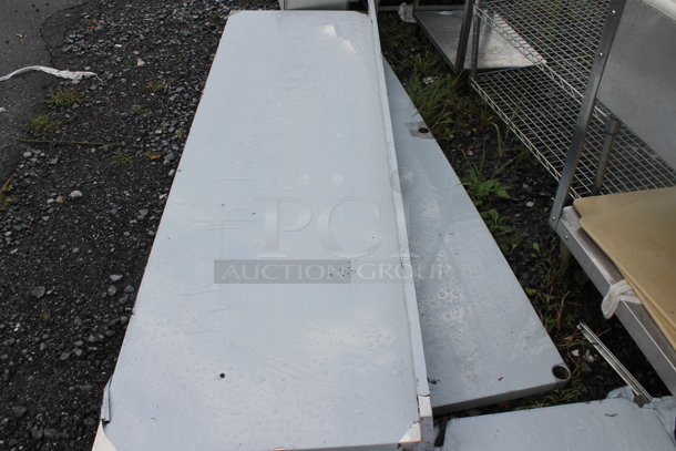BRAND NEW SCRATCH AND DENT! Regency Stainless Steel Commercial Table w/ Back Splash, Under Shelf and Legs. - Image 2 of 3