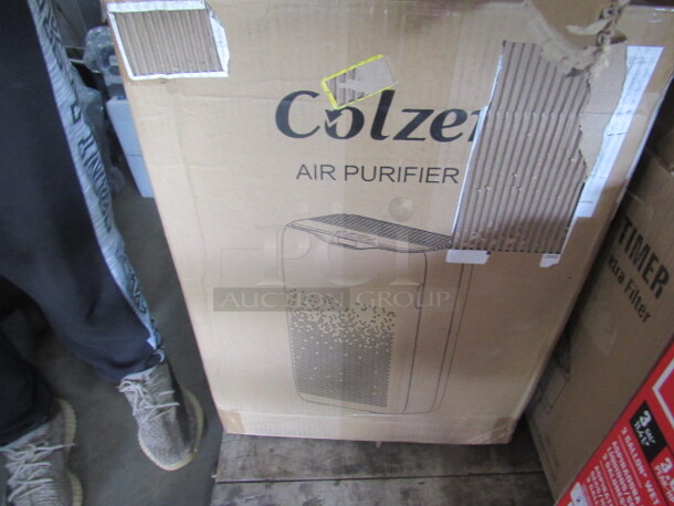 One NEW Colzer Air Purifier.