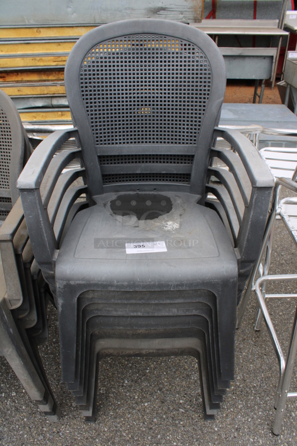 7 Poly Gray Patio Chairs w/ Arm Rests. 22x21x35. 7 Times Your Bid!