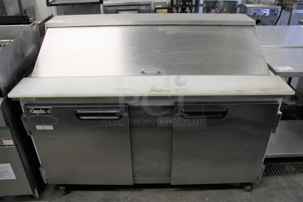 2015 Leader Model ESLM60S/C Stainless Steel Commercial Sandwich Salad Prep Table Bain Marie Mega Top on Commercial Casters. 115 Volts, 1 Phase. 60x33.5x45.5. Tested and Powers On But Does Not Get Cold