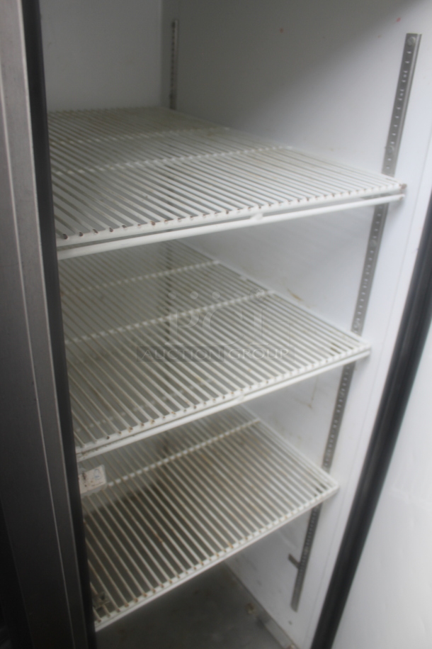 2014 True TG2R-2S ENERGY STAR Stainless Steel Commercial Two Door Reach In Cooler w/ Poly Coated Racks on Commercial Casters. 115 Volts, 1 Phase. Tested and Working! - Image 4 of 5