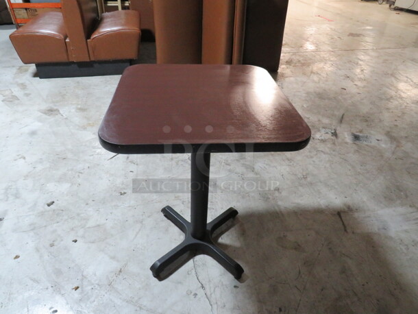 One Brown Laminate Table Top On A Pedestal Base. 24X26X29 - Image 1 of 1