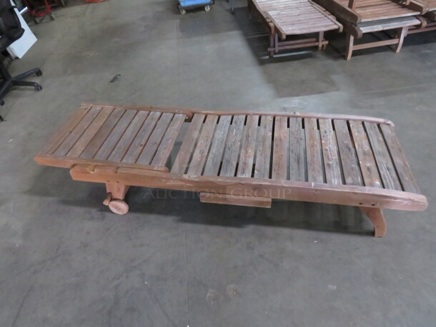 One Adjustable Wooden Chaise Lounger With 2 Wheels, And A Pullout Shelf. Needs A Lil Adjusting. 72X23 - Image 2 of 2