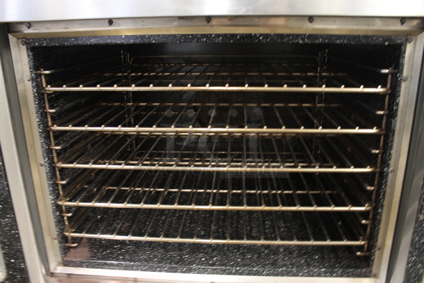 2 Vulcan ET88B Stainless Steel Commercial Electric Powered Full Size Convection Ovens w/ View Through Doors, Metal Oven Racks and Thermostatic Controls. 480 Volts, 3 Phase. 2 Times Your Bid!  - Image 5 of 7