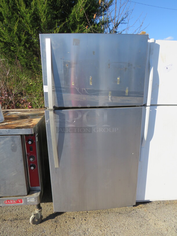 One Whirlpool Refrigerator/Freezer. 115 Volt. Model# WRT511SZDMOO. 33X30X66