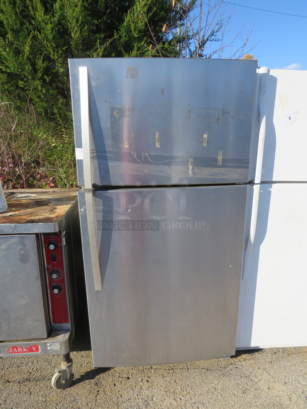 One Whirlpool Refrigerator/Freezer. 115 Volt. Model# WRT511SZDMOO. 33X30X66 - Image 1 of 1