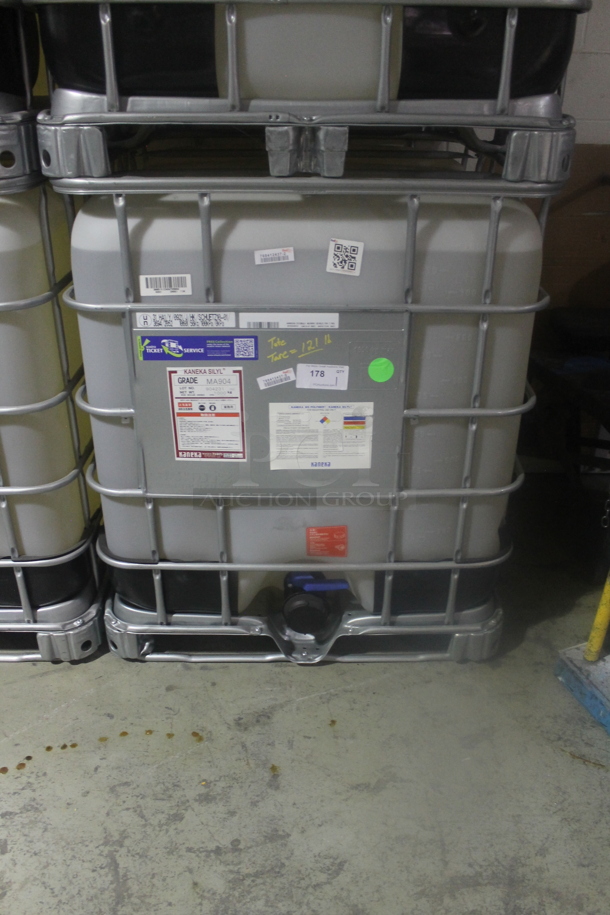 White Poly Tank in Metal Cage. BUYER MUST REMOVE. - Image 1 of 5