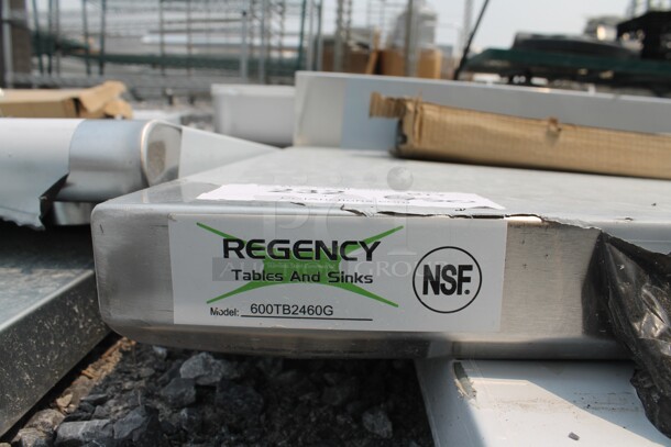 BRAND NEW SCRATCH AND DENT! Regency 600TB2460G Commercial Stainless Steel Disassembled Work Table With Backsplash, Undershelf And Galvanized Legs. - Image 2 of 6