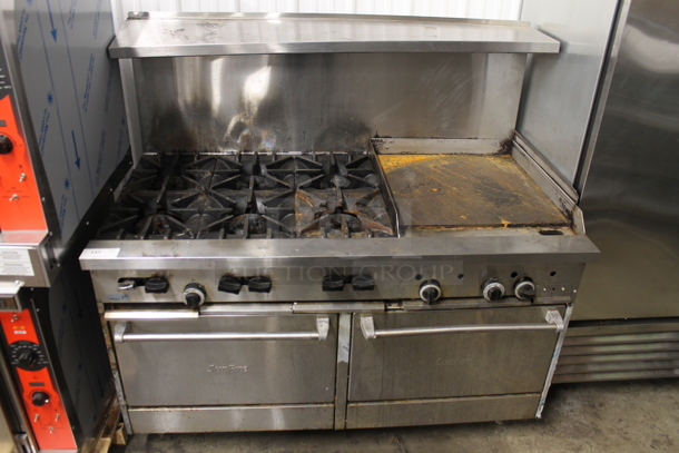 Garland X60-6G24RR Stainless Steel Commercial Natural Gas Powered 6 Burner Range w/ Flat Top Griddle, 2 Ovens, Over Shelf and Back Splash.