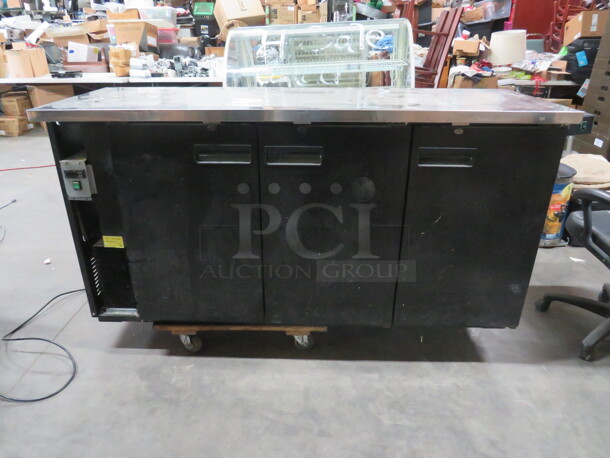 One Artic Air 3 Door Back Bar Cooler With 4 Racks. Model# ABB72. 115 Volt. Not Working. 73X24.5X35.5 - Image 1 of 5