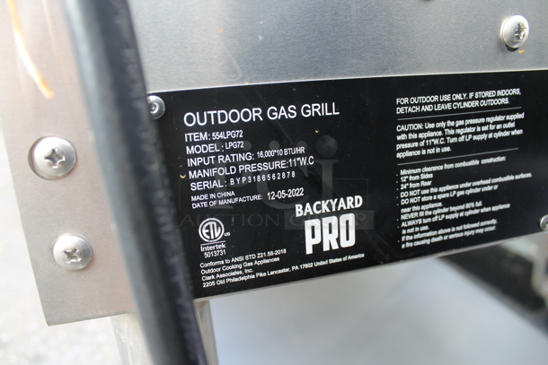 BRAND NEW SCRATCH AND DENT! 2022 Backyard Pro LPG72 Stainless Steel Commercial Propane Gas Powered Portable Catering Grill w/ Under Shelf on Commercial Casters.  - Image 5 of 5