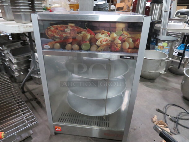 One Working Sky Warmer 22 Inch Rotating Heated Pizza Merchandiser With 3 Levels. This Model Will Hold 3 18 Inch Pizzas. Model# PD3TS18. 127 Volt. 718 Watt. X$2432.00.X  - Image 1 of 4