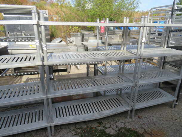 One Metal Shelving System  With 4 Shelves. 48X18X61 - Image 1 of 1