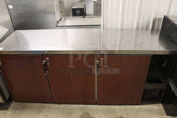 Perlick BS84 Commercial Stainless Steel Solid Door Back Bar Cooler With Steel Racks And Faux Wood Cabinets. 115V, 1 Phase. Tested and Powers On But Does Not Get Cold