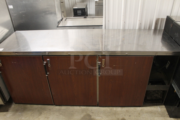 Perlick BS84 Commercial Stainless Steel Solid Door Back Bar Cooler With Steel Racks And Faux Wood Cabinets. 115V, 1 Phase. Tested and Powers On But Does Not Get Cold - Image 1 of 8