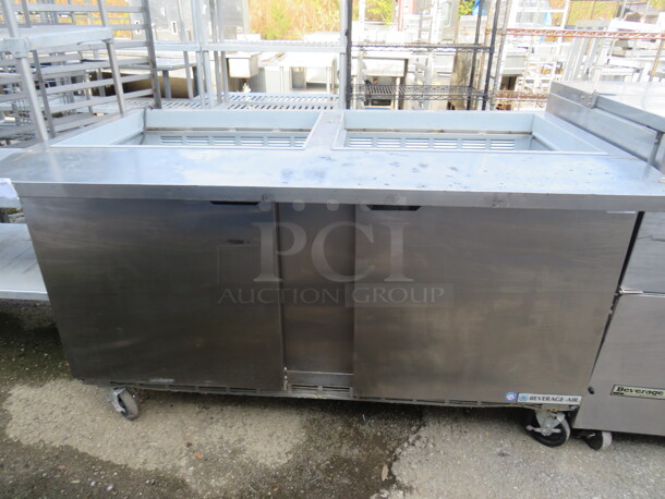 One Beverage Air 2 Door Prep Table On Casters. No Top. Model# SPE60-24M. 60X34X35. $5868.32 - Image 1 of 3