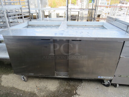 One Beverage Air 2 Door Prep Table On Casters. No Top. Model# SPE60-24M. 60X34X35. $5868.32