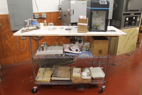 Cart w/ 2 Wire Under Shelves w/ Contents on Commercial Casters.