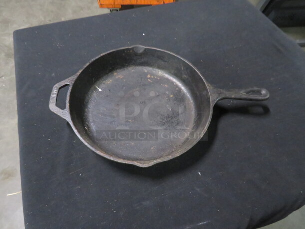 One 10 Inch Lodge Cast Iron Skillet.