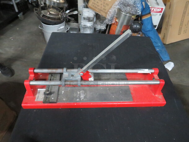One Tomecanic Tile Cutter. #567S.