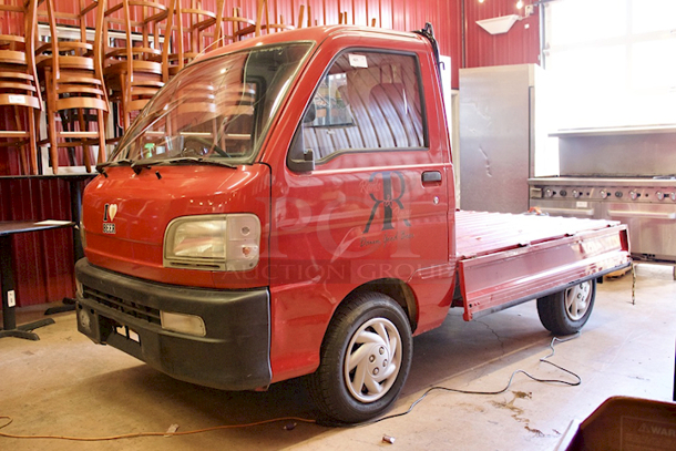 WORK HORSE! 1999/2000 Diahatsu Hijet S210P Pick-Up/Flatbed Truck. 64875Km / 40311 Miles - Runs Perfectly! 5-Speed Manual Transmission, 4 Wheel Drive, 600CC 3 Cylinder, Fuel Injected, Bed Converts From Pick-Up Truck To Flat Bed. Includes Spare Tire. Minor Rust On Flat Bed Panels - Driver side mirror needs to be re-attached. Includes All Original Paperwork. Made In Japan. - Image 8 of 12