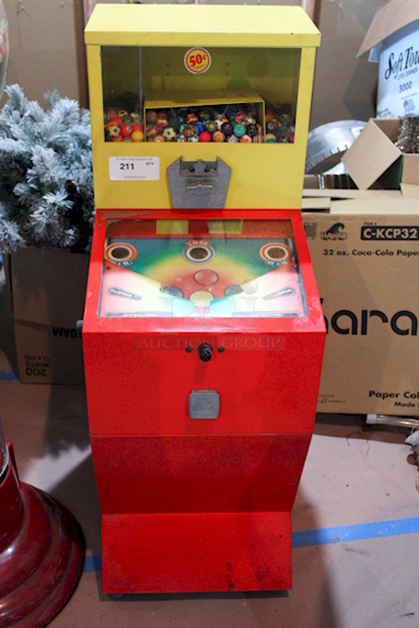 EXCITING! Impulse Industries Play More Win More Gumball Machine, High Quality Pinball Style Gumball Vending Machine. Accepts Quarters, .50¢ To Play. On Heavy Duty Commercial Casters, Holds Up To $400.00 In Quarters. Capable Of Vending Gumballs, Bouncy Balls, Or Jawbreakers. Currently Filled With Bouncy Balls. 54" H x 18" W x 24" D 
 - Image 1 of 10