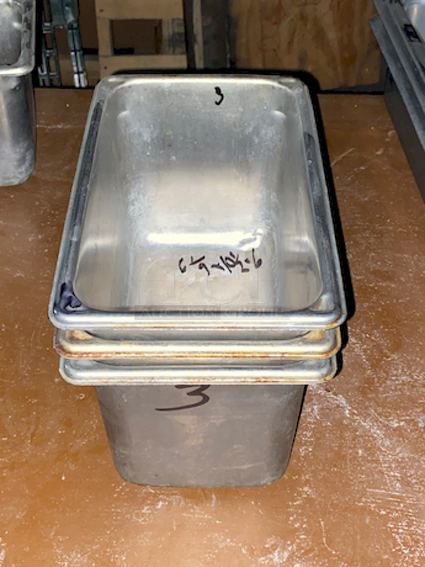 EVERYTHING ON THE SHELVES! Includes 8 Perforated Full Size Pans (2” Deep”), 46 Stainless Steel Milkshake Cups, 3 Full Size Pans (4” Deep), (3) 6” Deep 1/3 Pans, ¼ Pan, 4” Deep Full size Pans, (79)  Aladin Temp-Rite Induction Heated Dishes With (39) Covers and (25) Bowls,  San Jamar SAF-T-ICE Tote.  - Image 8 of 12