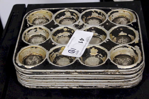 AWESOME! 12 Hole Muffin Pans. Muffin Hole Measurements 2-1/2”x1”. OA 13x10x1 10x Your Bid - Image 1 of 1