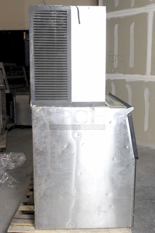 NICE! Manitowoc QY1805W3 1800lbs Ice Machine, Water Cooled & Follett SG1350S Bin. 

In Working Order but, Missing The Pump and Water Carton.

48x31x69-1/2 - Image 7 of 8