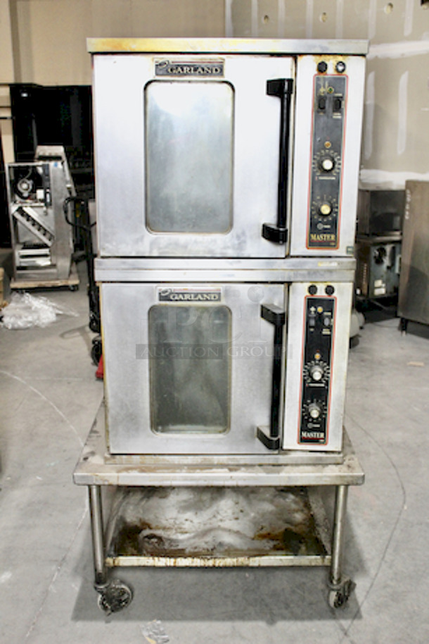 Garland MCO-ES-20-S Double Deck Standard Depth Full Size Electric Convection Oven - 208V, 1 Phase, 20.8 kW On Equipment Stand With Undershelf and Commercial Casters. 36x44x74                     

Not Tested. 