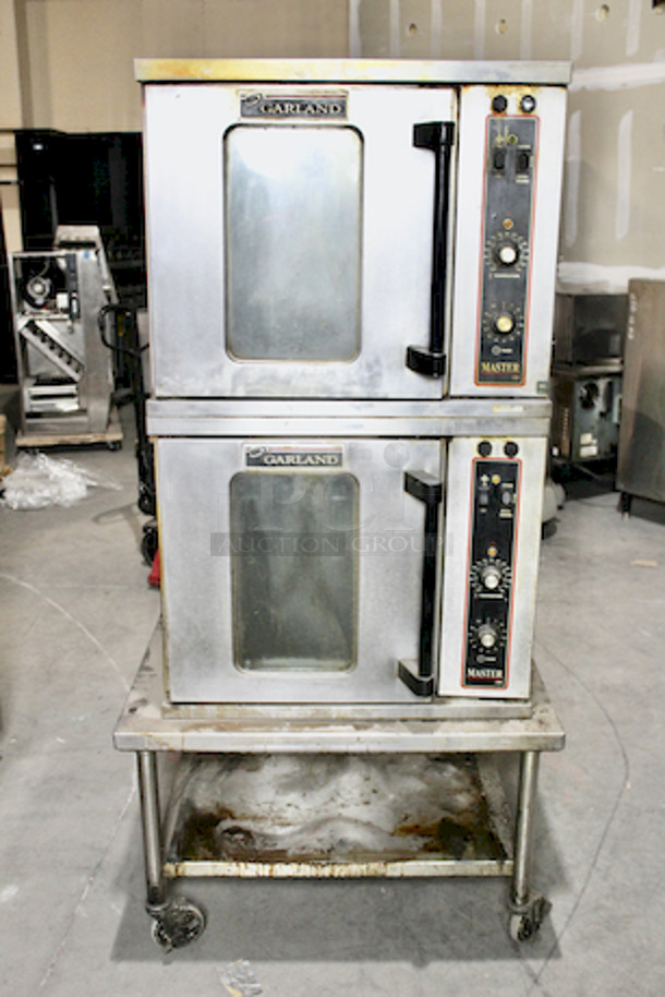 Garland MCO-ES-20-S Double Deck Standard Depth Full Size Electric Convection Oven - 208V, 1 Phase, 20.8 kW On Equipment Stand With Undershelf and Commercial Casters. 36x44x74                     

Not Tested.  - Image 1 of 7