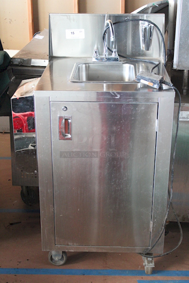 AMAZING! Crown Verity CV-PHS-4C Space Saver Single Bowl Cold Water Portable Hand Sink Cart. Includes: Electric Pump (120V), Hands Free Pump Saver Foot Pedal, Power Outlet, Soap Dispenser Holder and Paper Towel Dispenser. Allows For Hook-Up To City Water. On Commercial Casters. Keys Not Included. 25x24-1/4x47-3/4 

Condition is 9/10 - Lighting Makes It Difficult To Photograph - Image 1 of 12