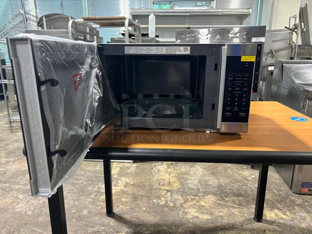 Brand New Scratch & Dent Sharp - 1.1 cu ft Stainless Countertop Microwave with 1000 watts - Image 3 of 6