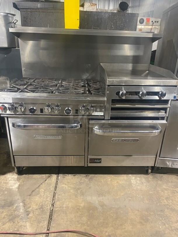 Southbend Commercial LP Powered 6 Burner Stove With Right Side Flat Griddle! Griddle Has Side Splashes! With Raised Back Splash And Salamander Shelf! With 2 Oven Underneath! Metal Oven Racks! All Stainless Steel! On Casters!