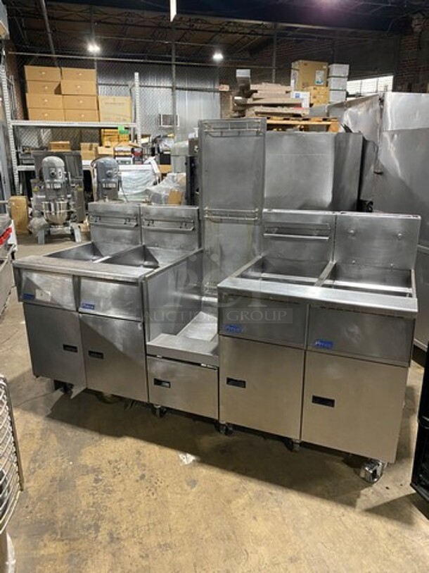 FAB! Pitco Frialator Commercial Natural Gas Powered 4 Bay Deep Fat Fryer! With Middle Fryer Basket Rack! All Stainless Steel! On Casters! Model: SGH50 SN: G10DA010387 - Image 1 of 12
