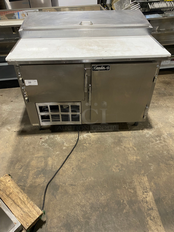 Leader Commercial Refrigerated Pizza Prep Table! With Commercial Cutting Board! With 2 Door Storage Space Underneath! All Stainless Steel On Legs!