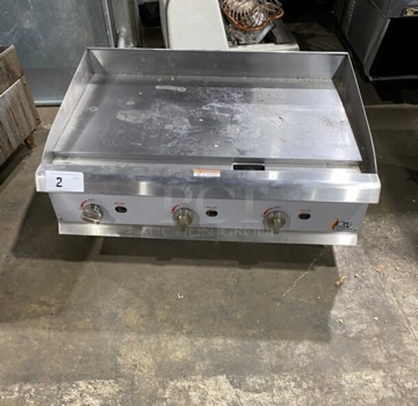 NEW! OUT OF THE BOX! CPG Commercial Countertop Natural Gas Powered Flat Top Griddle! With Back And Side Splashes! All Stainless Steel! On Small Legs! SN: 2108004582