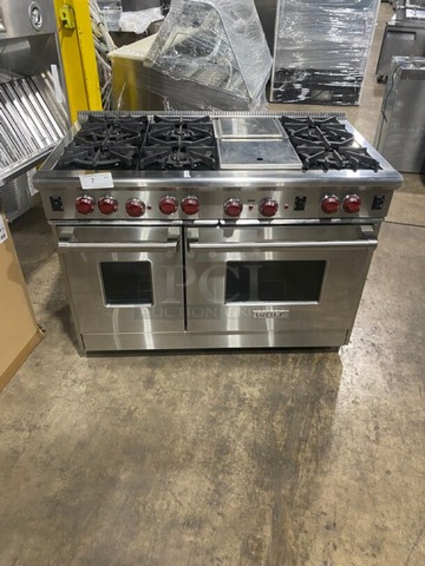 AMAZING! ALL ONE MONEY! Wolf Commercial Gas Powered 6 Burner Stove! With Center Mini Flat Top Griddle! With 1 Full Size & 1 Mini Oven Underneath! With Ventilation Hood System! All Stainless Steel! - Image 1 of 12