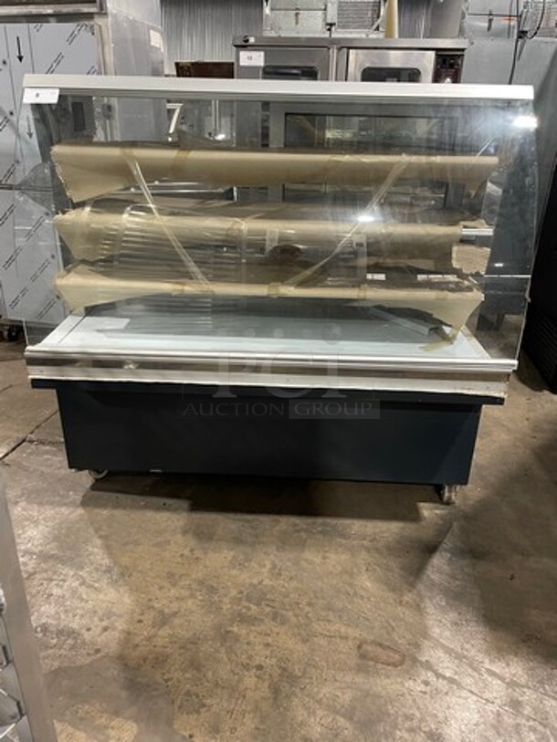 WOW! NEW! Commercial Display Case Merchandiser! With Curved Front Glass! With Sliding Rear Access Doors! Stainless Steel Body!