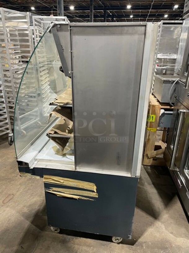 WOW! NEW! Commercial Display Case Merchandiser! With Curved Front Glass! With Sliding Rear Access Doors! Stainless Steel Body! - Image 2 of 10
