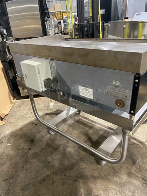WOW! NEW OUT OF THE BOX! Garland Commercial Countertop Electric Powered Flat Top Griddle! With Back And Side Splashes! On Legs! On Equipment Stand! All Stainless Steel! On Casters! Model: E2448G SN: 0404ME0033 208V 60HZ 3 Phase - Image 4 of 10