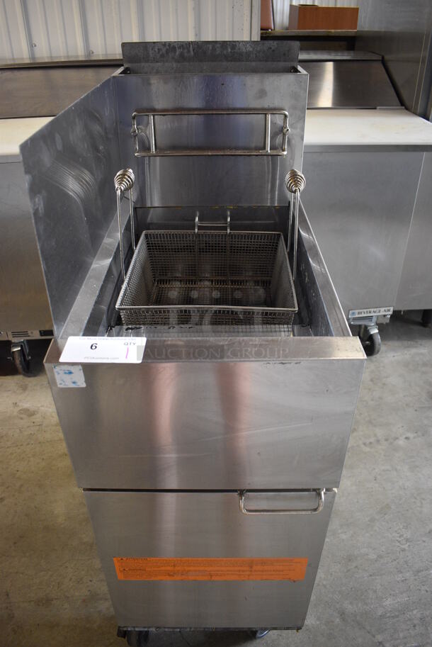 2019 Frymaster Model 1ESG35T0ZN0ZZNG Stainless Steel Commercial Floor Style Natural Gas Powered Deep Fat Fryer w/ Left Side Splash Guard and Fry Basket on Commercial Casters. 70,000 BTU. 16x29x46
