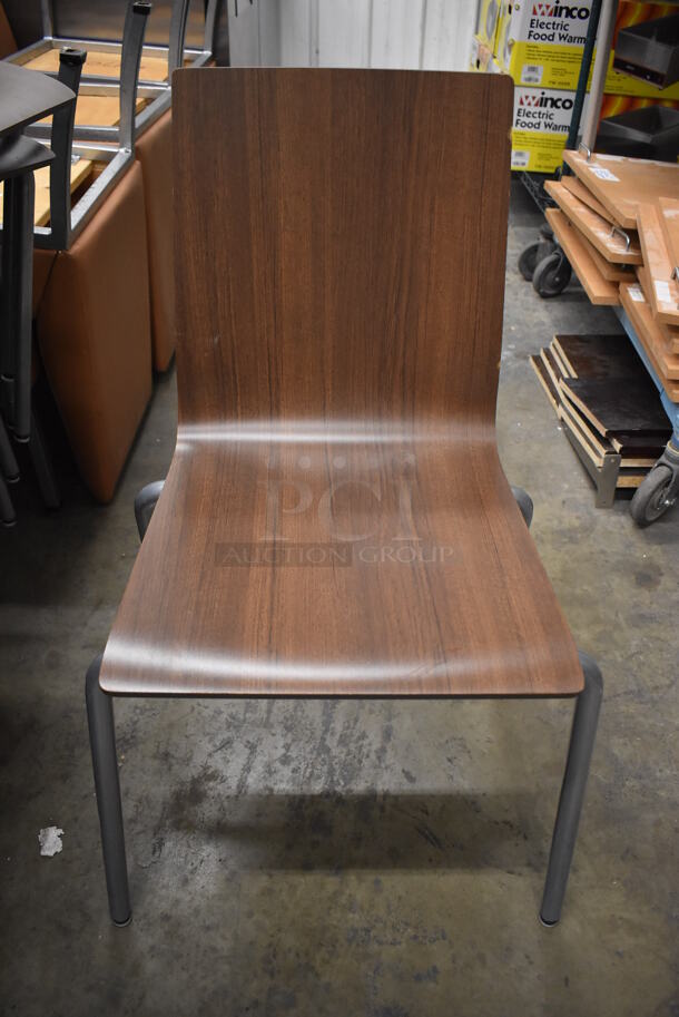 8 Wood Pattern Dining Chairs on Metal Legs. 20x17x34. 8 Times Your Bid!