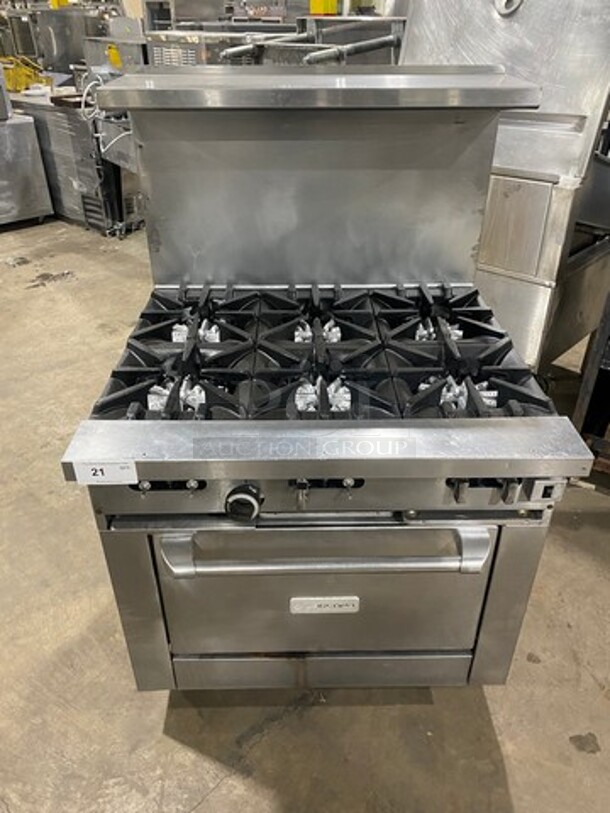 Garland Commercial Natural Gas Powered 6 Burner Stove! With Raised Back Splash And Salamander Shelf! With Oven Underneath! Metal Oven Rack! All Stainless Steel! On Casters! - Item #1059052