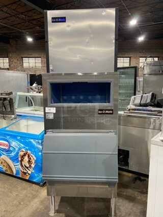 Ice-O-Matic Commercial Ice Making Machine! On Commercial Ice Bin! All Stainless Steel Body! On Legs! Model: ICE1006HW3 SN: 11031280012753 208/230V 60HZ 1 Phase, Model: B70030 SN: J04815
