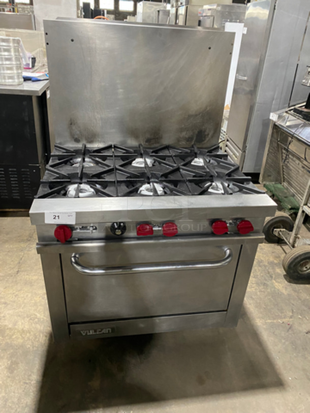 SWEET! Vulcan Commercial Natural Gas Powered 6 Burner Range! With Full Size Oven Underneath! With Raised Backsplash! All Stainless Steel! On Legs!