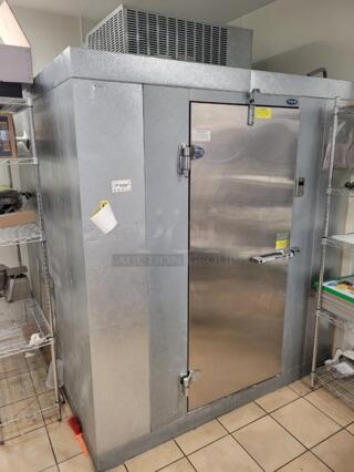 Norlake SELF CONTAINED 6'x6'x6' Walk In Cooler with Floor 208-230 Volt 1 Phase Pictures Show Unit In Place Before Removal.